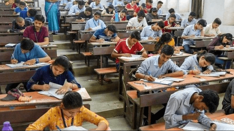 Government recruitment examination hall showing structured large-scale assessment environment