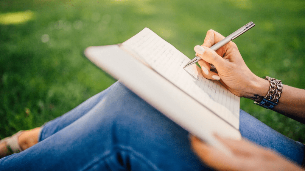 Person journaling quietly to gain emotional clarity and self-understanding