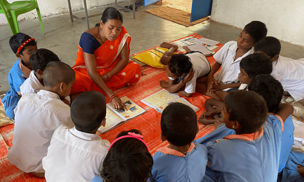 Indian student practicing Marathi numbers in notebook building early language confidence