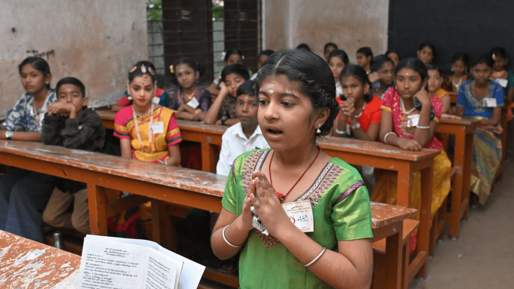 Interactive classroom activity teaching Marathi numbers through rhythm and repetition