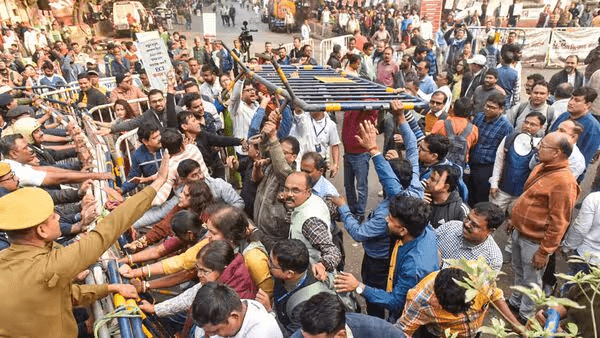 Bengali individual reflecting quietly before sharing personal expression